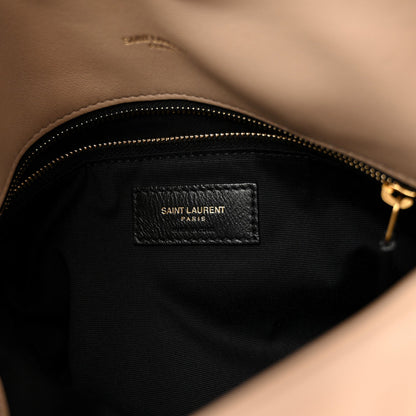 Saint Laurent interior label on black lining with zip closure, gold-tone zipper