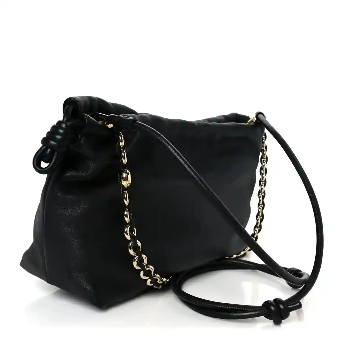 Black leather clutch with chain strap and long leather shoulder strap, side view.