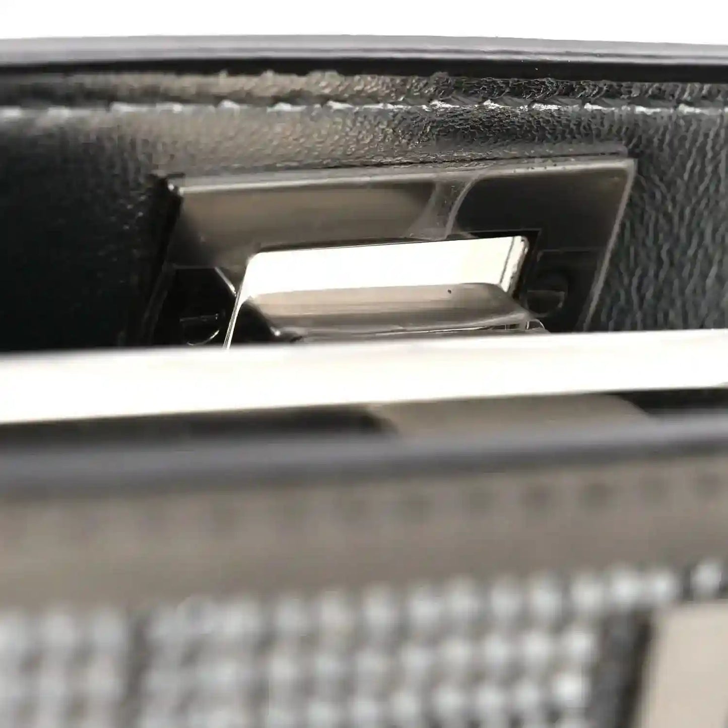 Silver leather satchel clasp with peekaboo hardware, close-up