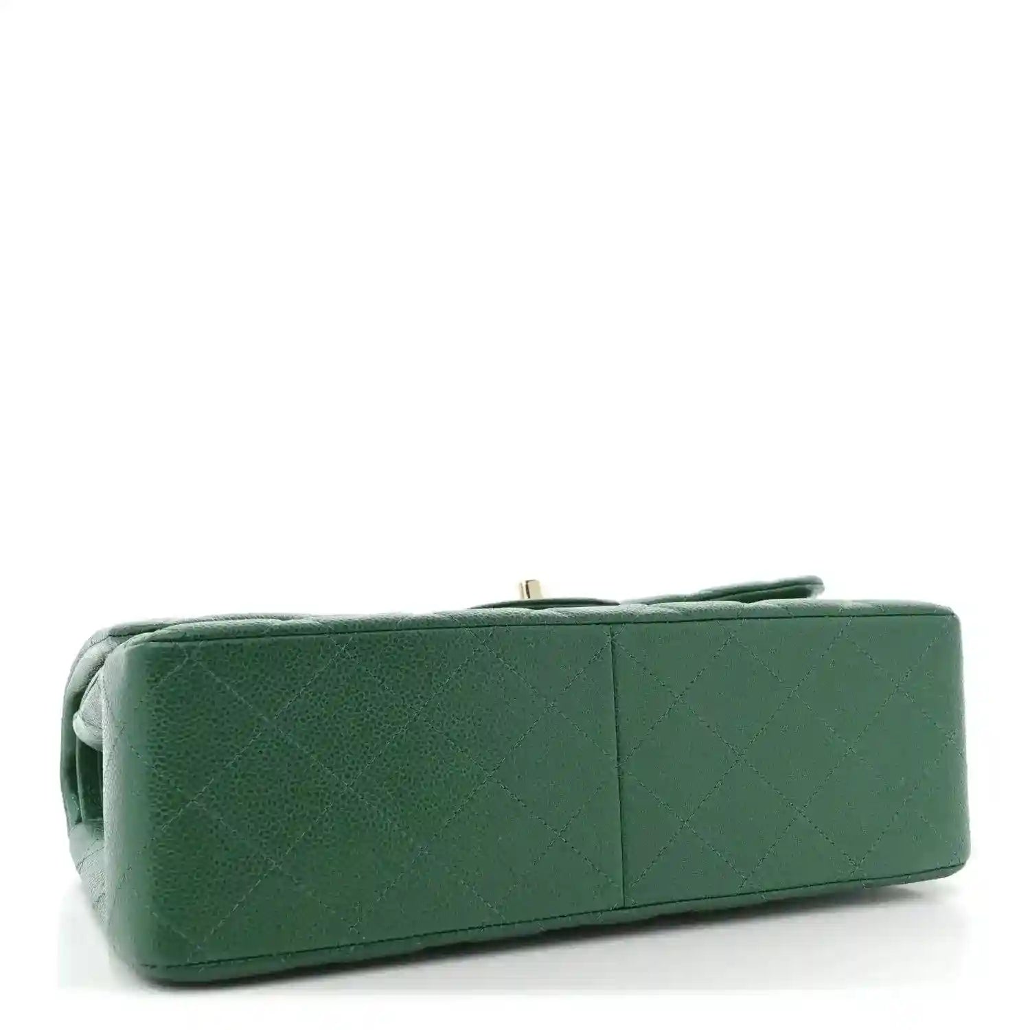 Green quilted leather bag underside with top handle and structured base.