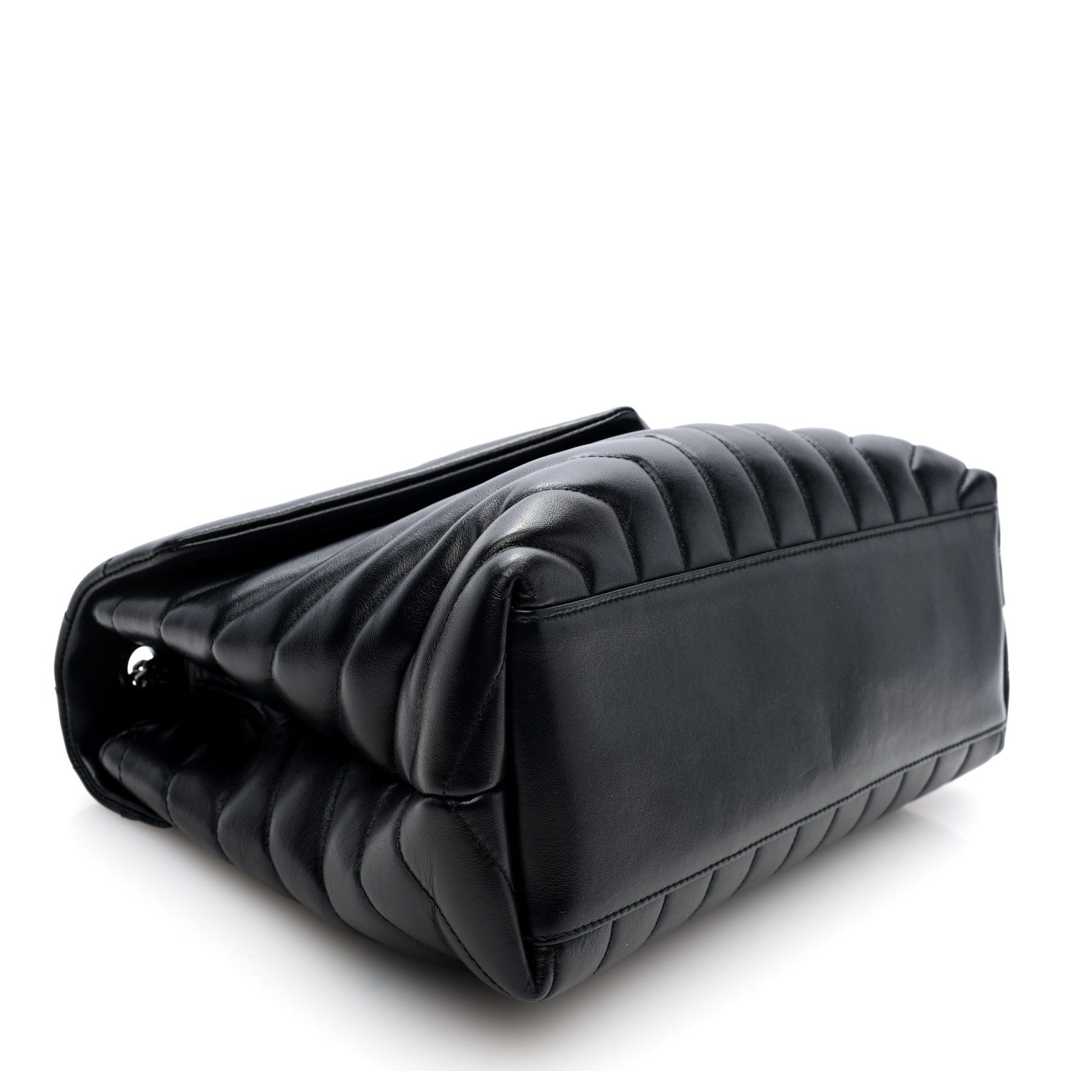 Black quilted calfskin satchel with rolled flap edge, side angle
