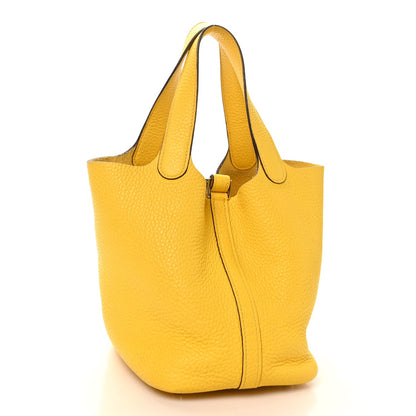 Lime yellow leather Picotin Lock tote with front seam and top handles