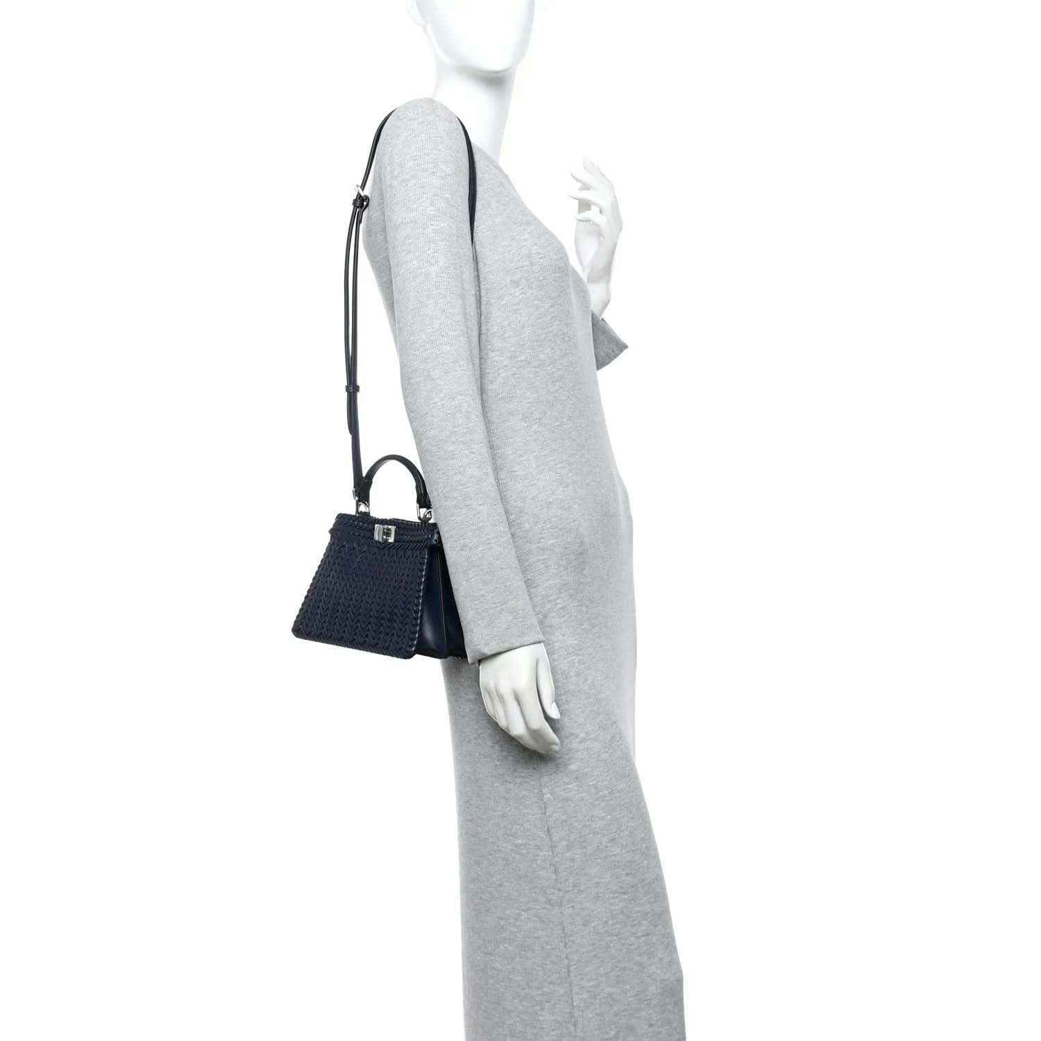 Midnight blue leather petite satchel with woven texture, short strap and long crossbody strap