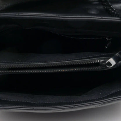 Black satchel interior with zip closure and metal zipper pull