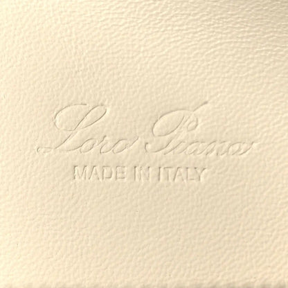 Grained calfskin pouch in white with embossed logo and 'MADE IN ITALY'