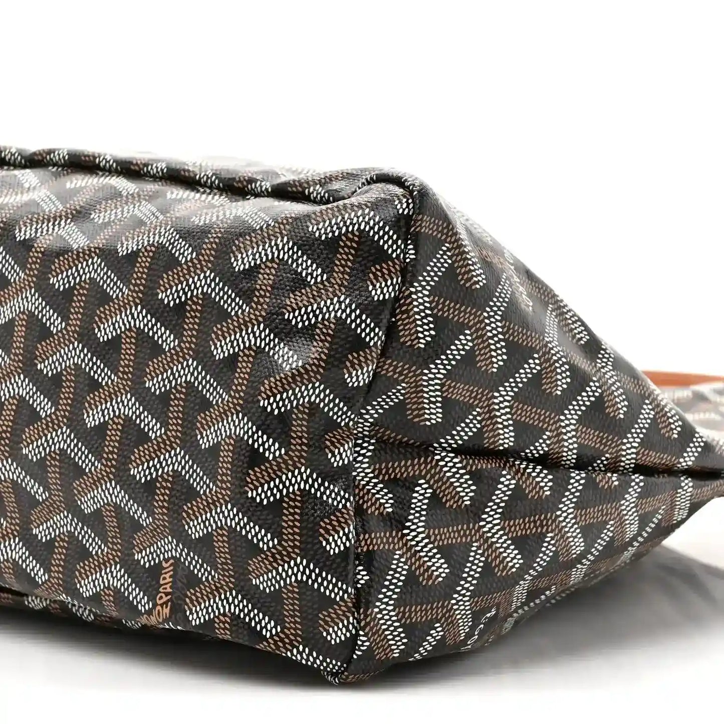 Goyard hobo bag close-up of patterned canvas corner and stitched edge