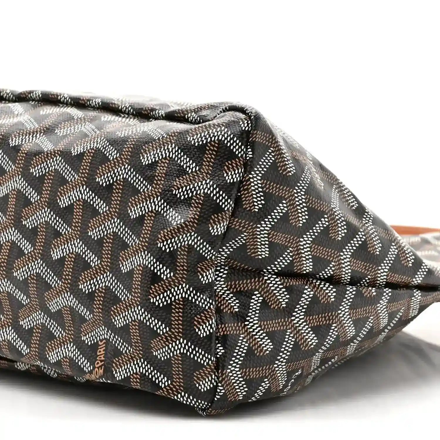 Goyard hobo bag close-up of patterned canvas corner and stitched edge