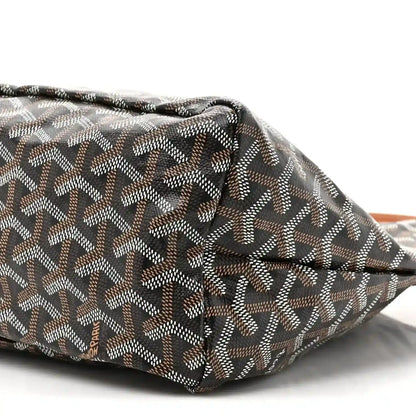 Goyard hobo bag close-up of patterned canvas corner and stitched edge