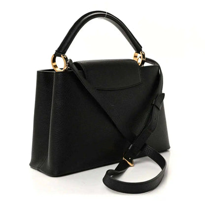 Louis Vuitton Capucines BB bag in black leather with top handle and crossbody strap