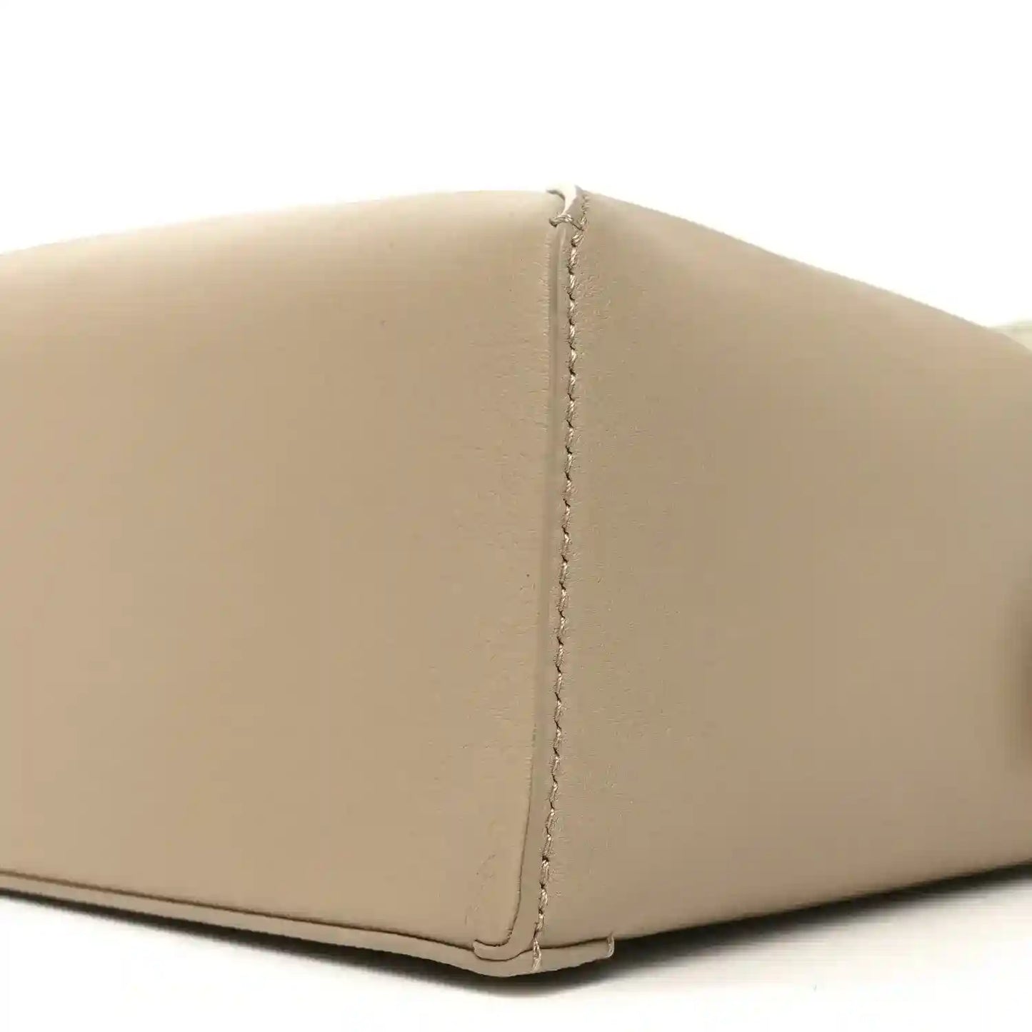 Small Puzzle edge bag side seam detail, soft white calfskin with vertical stitching