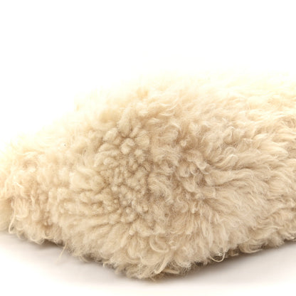 SAINT LAURENT shearling shoulder bag, natural plush curl texture close-up