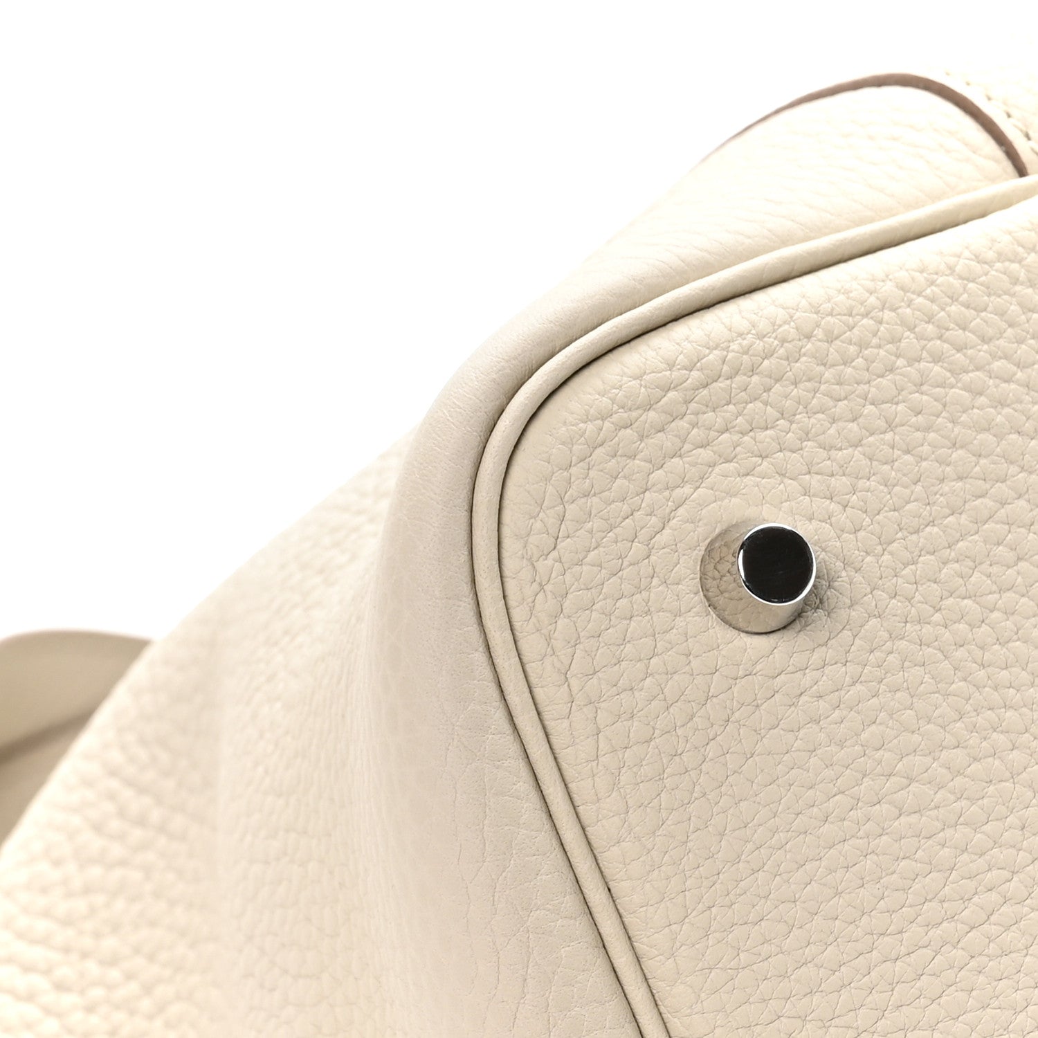 Ivory leather tote bag corner with round snap hardware