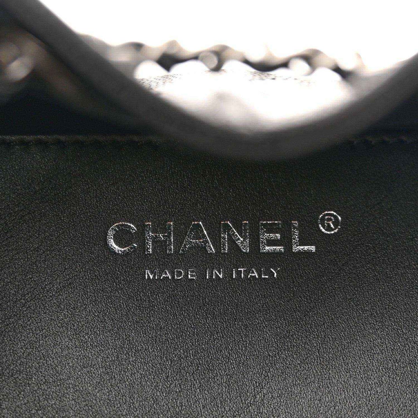 Black leather interior with CHANEL logo and "MADE IN ITALY" stamp.