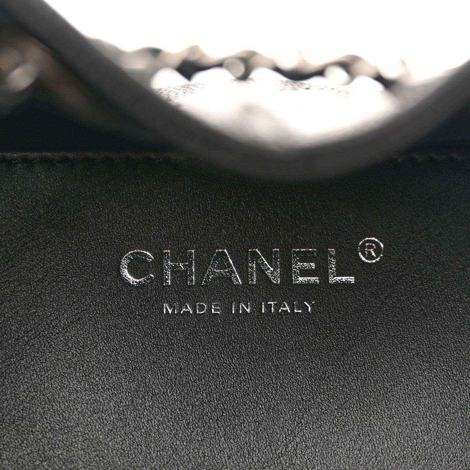 Black leather interior with CHANEL logo and "MADE IN ITALY" stamp.