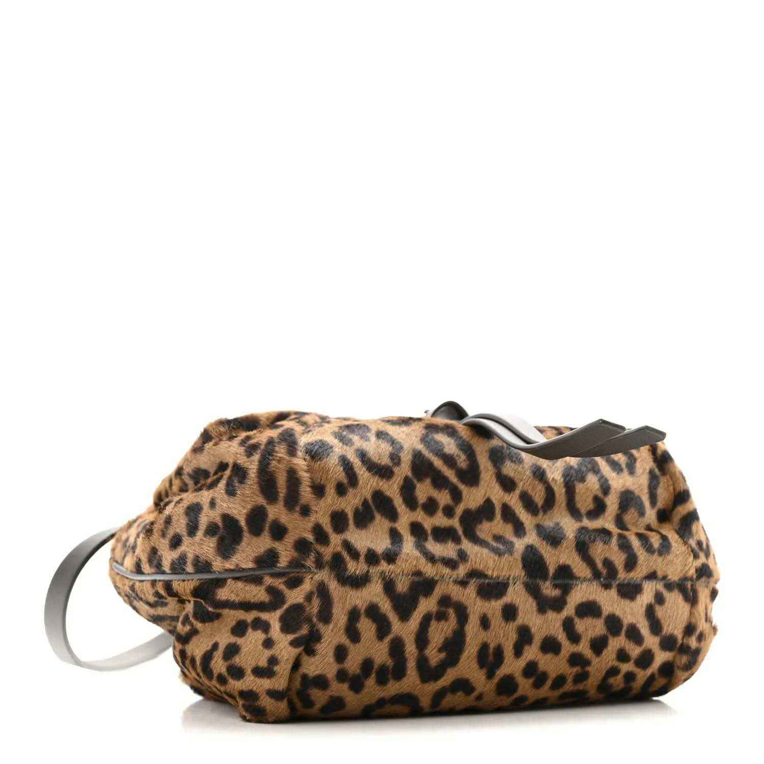 Leopard-print mini spy bag with short handle and black crossbody strap.
