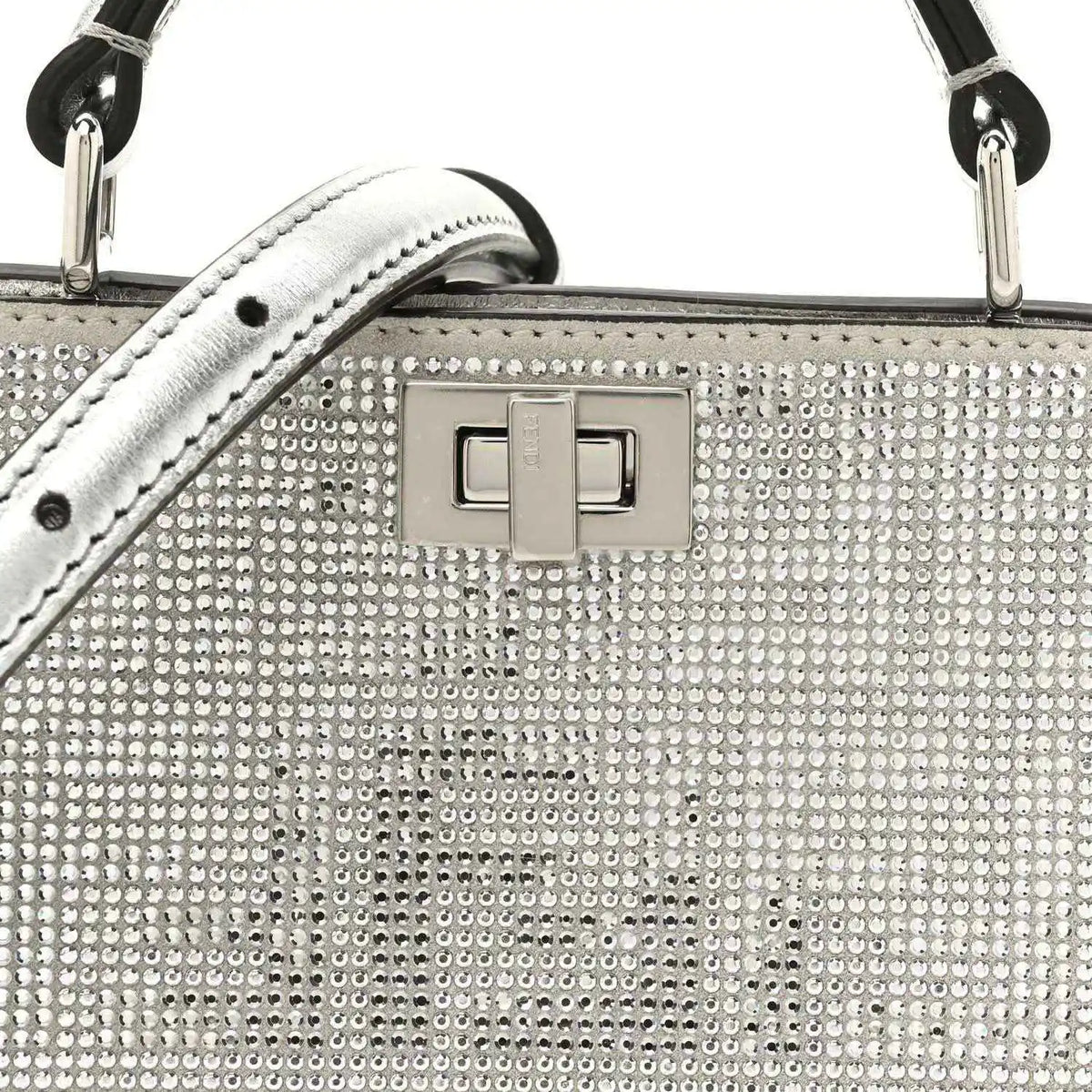 Crystal-embellished front panel with square logo turn-lock clasp, silver tone hardware.
