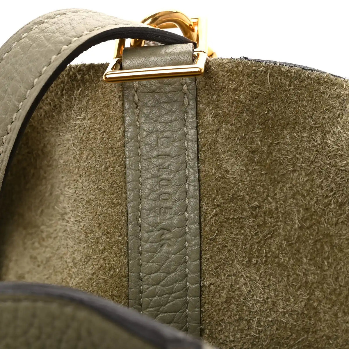 Sauge leather tote bag close-up of gold top hardware and strap stitching