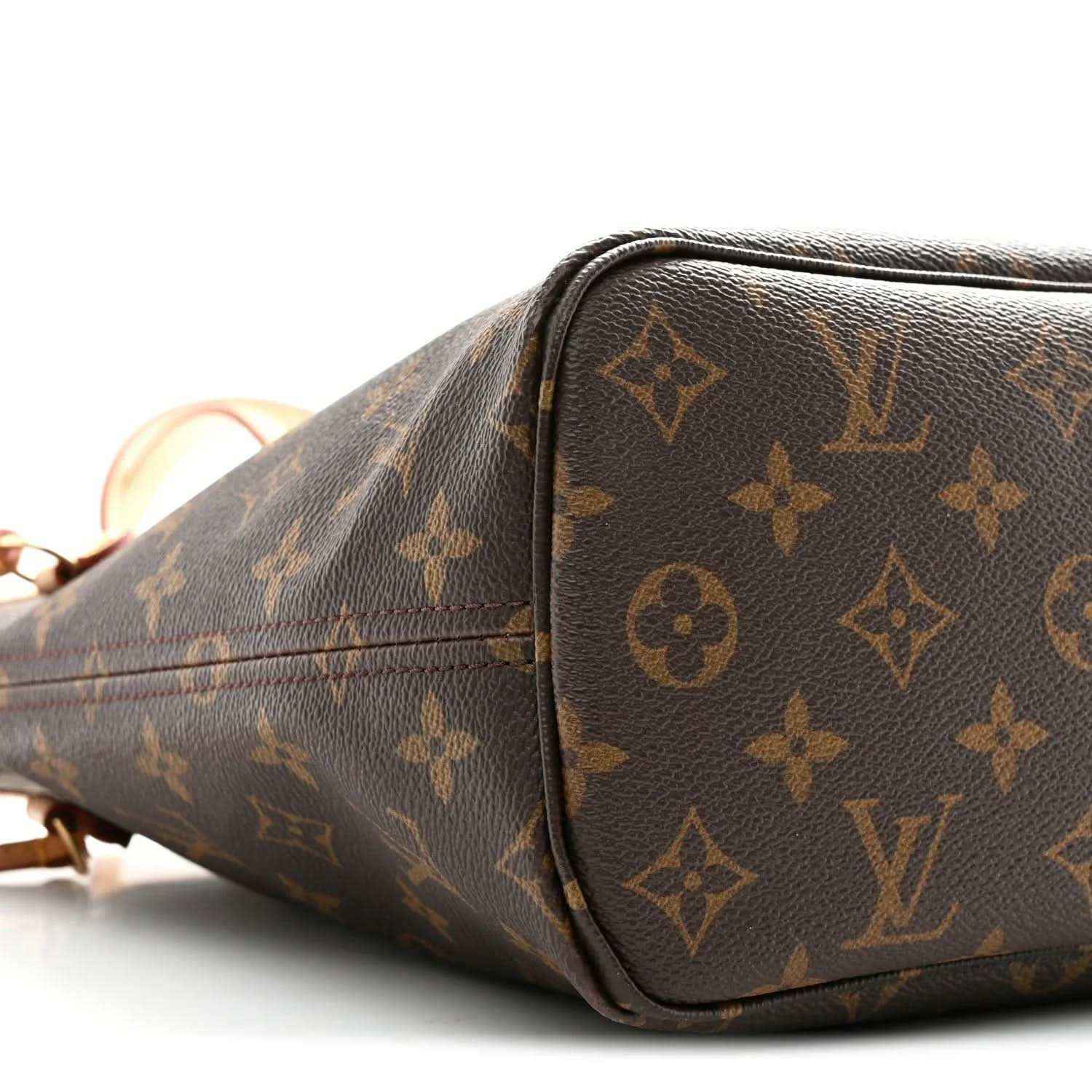Louis Vuitton monogram canvas tote bag side with stitched corner and trim