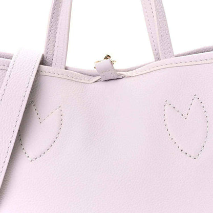 Lilac BB bag front with stitched heart motif and top handle tab