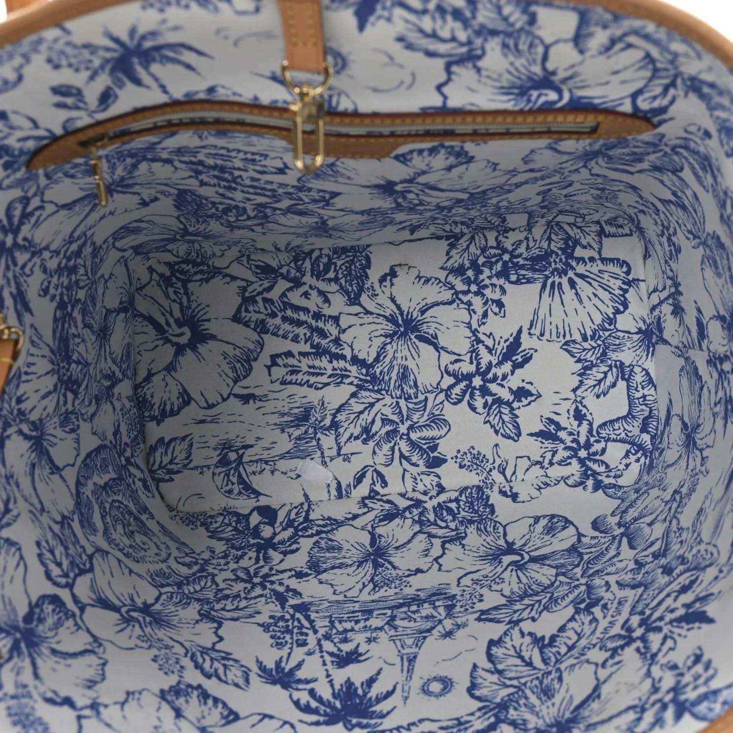 Neverfull interior lining with blue floral toile pattern and tan leather accents