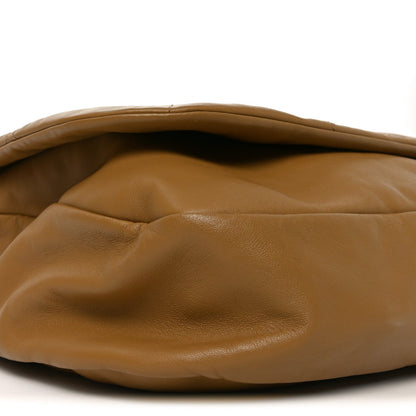 Tabac brown lambskin shoulder bag base with smooth padded quilting texture