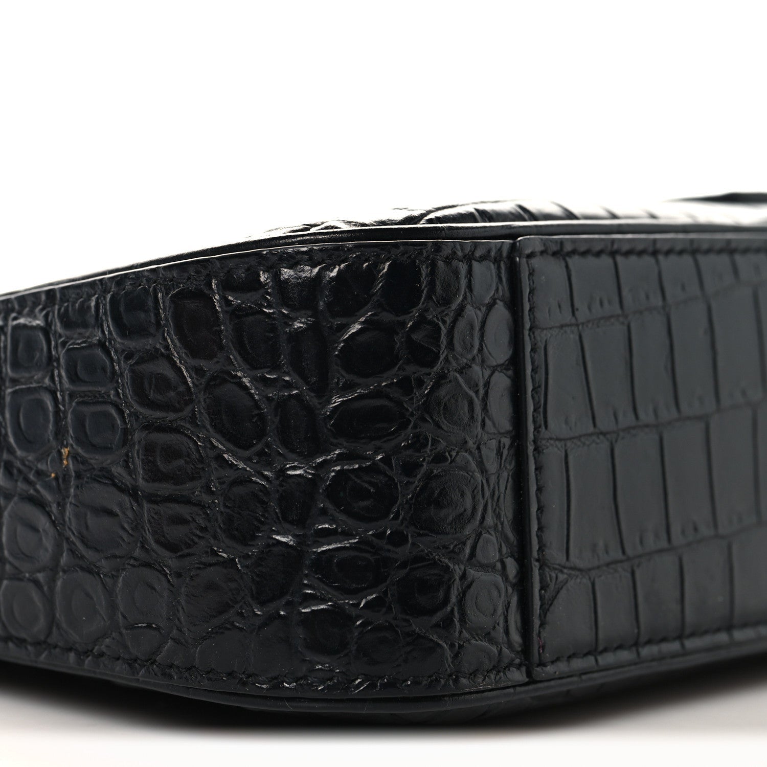 Black crocodile-embossed hobo shoulder bag side panel close-up