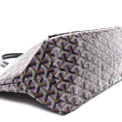 Tote bag folded corner view, monogram fabric in light tones with dark and purple accents