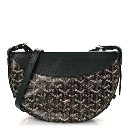 Black-and-brown monogram canvas crossbody handbag with leather flap and shoulder strap