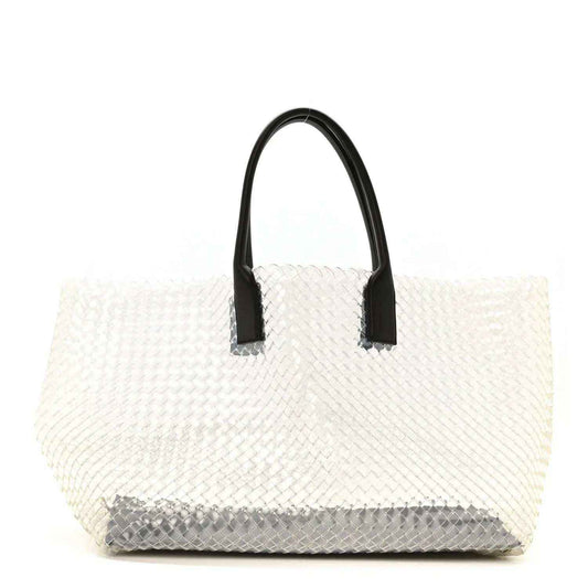 Large tote bag with white woven PVC body and black leather top handles