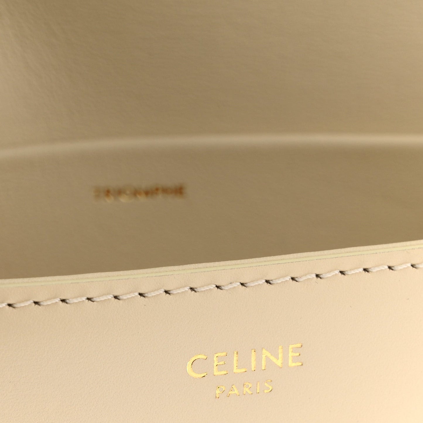 Celine Paris embossed logo on nude calfskin lining with stitched border