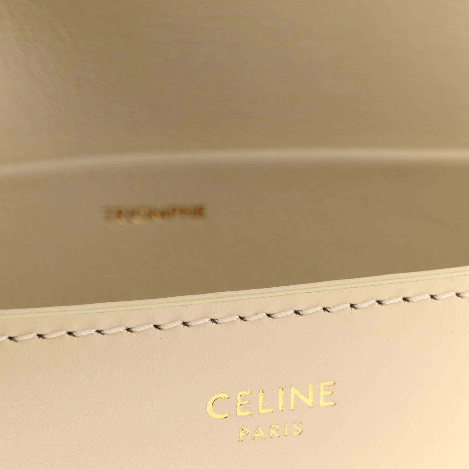 Celine Paris embossed logo on nude calfskin lining with stitched border