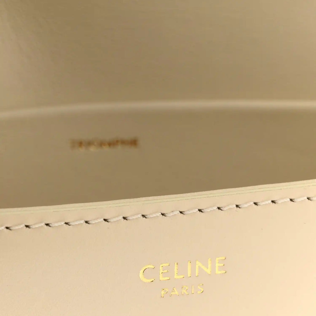Celine Paris embossed logo on nude calfskin lining with stitched border
