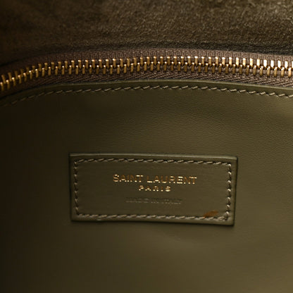Saint Laurent Paris leather bag interior label with gold zipper