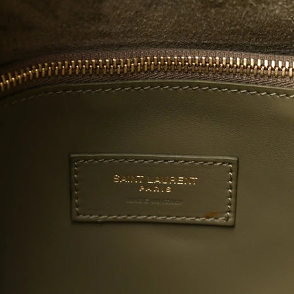 Saint Laurent Paris leather bag interior label with gold zipper