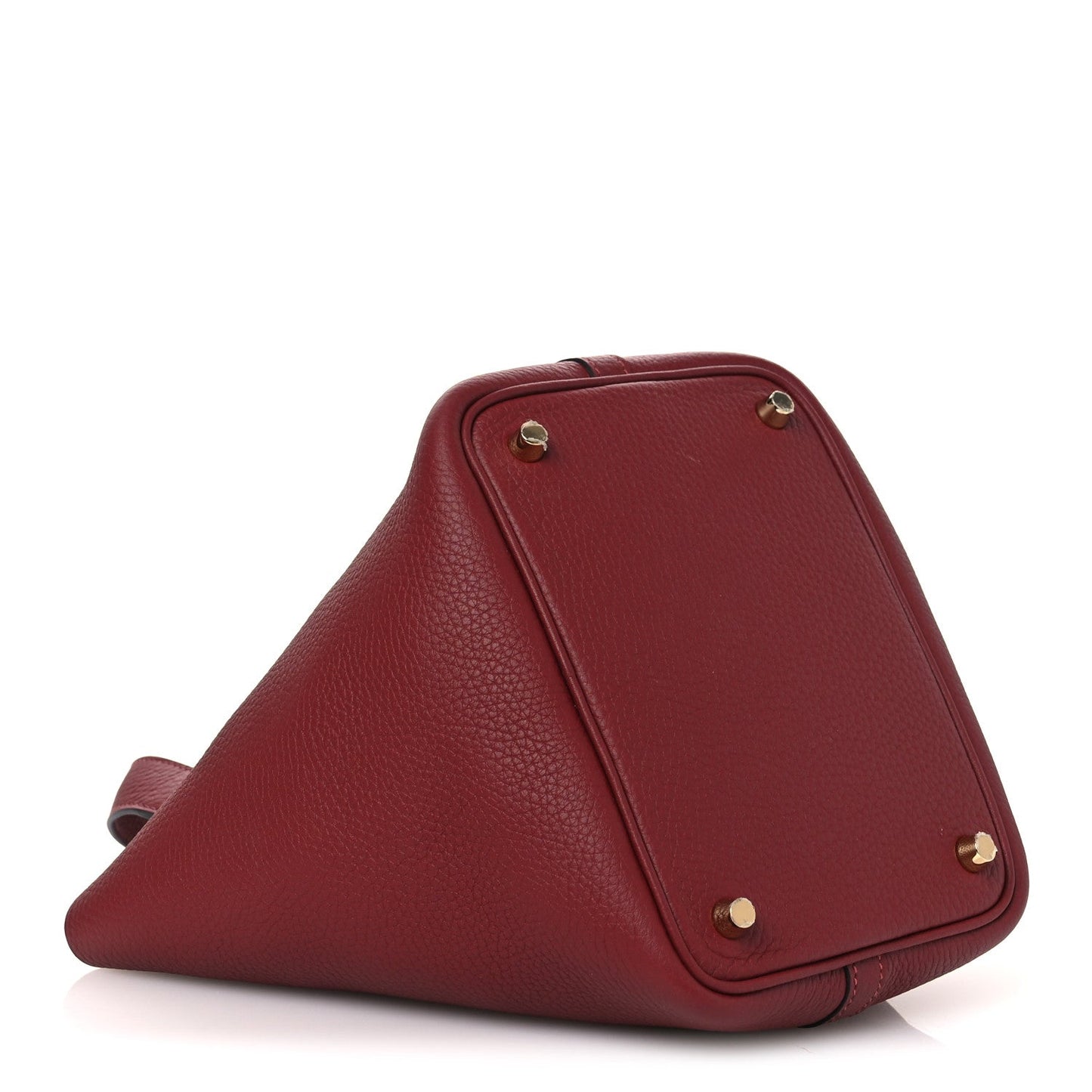 Burgundy grained calfskin leather tote with gold-tone corner studs and triangular flap