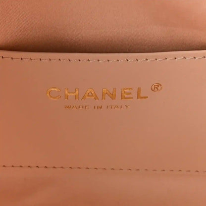 Chanel designer logo on copper leather lining, with Made in Italy text.