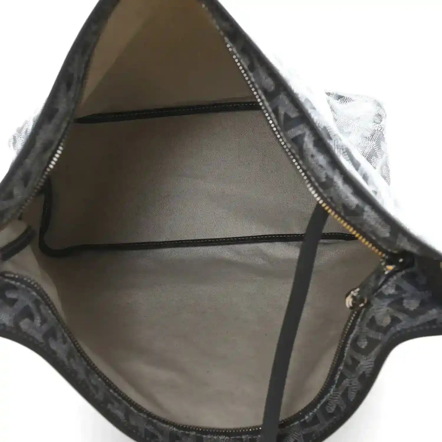 Grey hobo bag interior with leather trim and open top lining