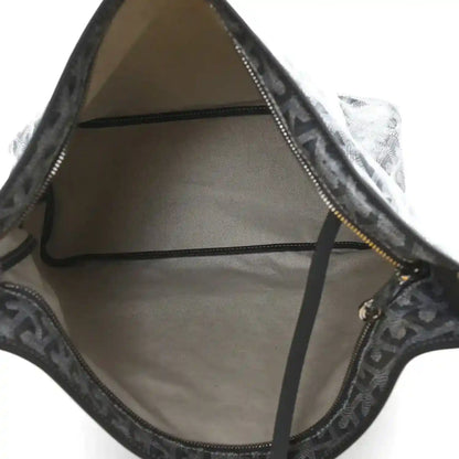 Grey hobo bag interior with leather trim and open top lining