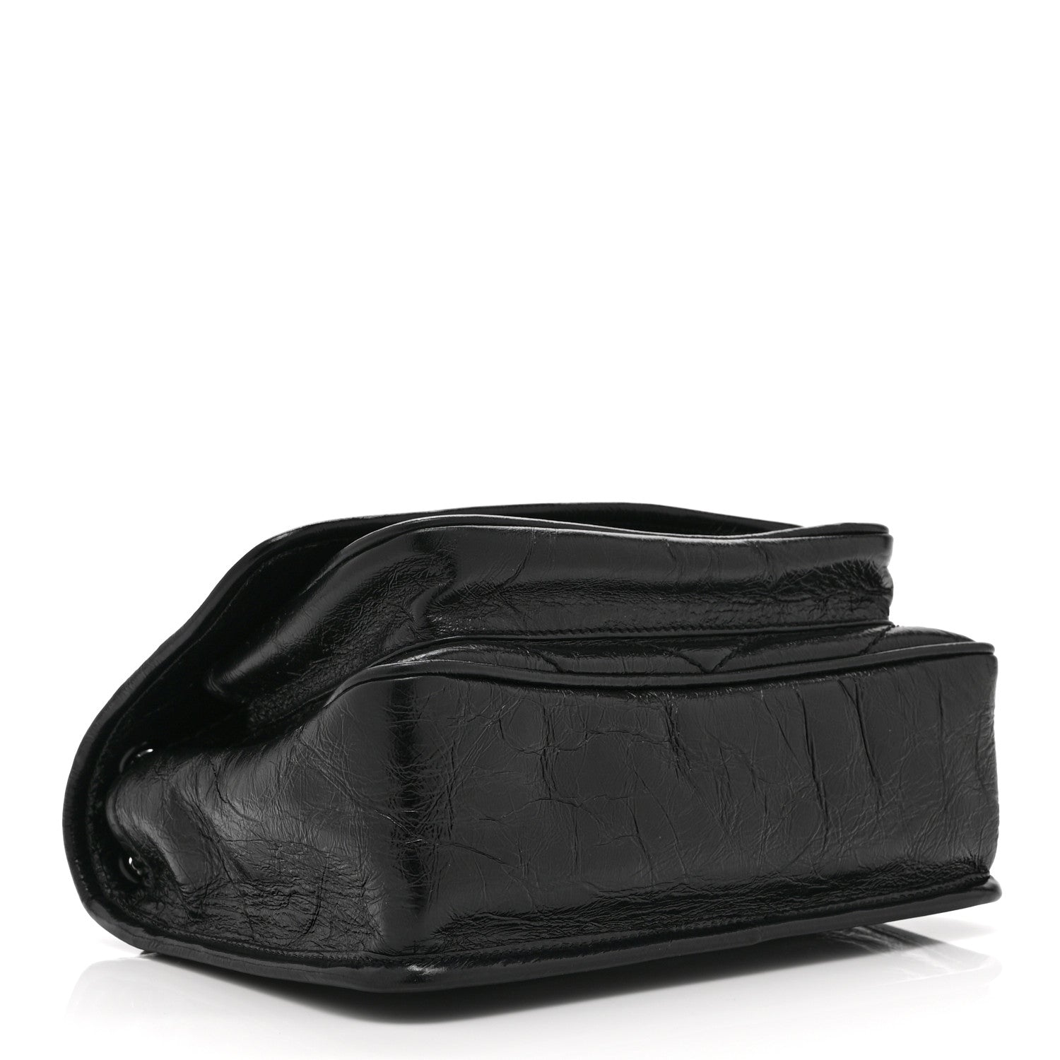 Black leather satchel bag with crinkled texture and folded top flap