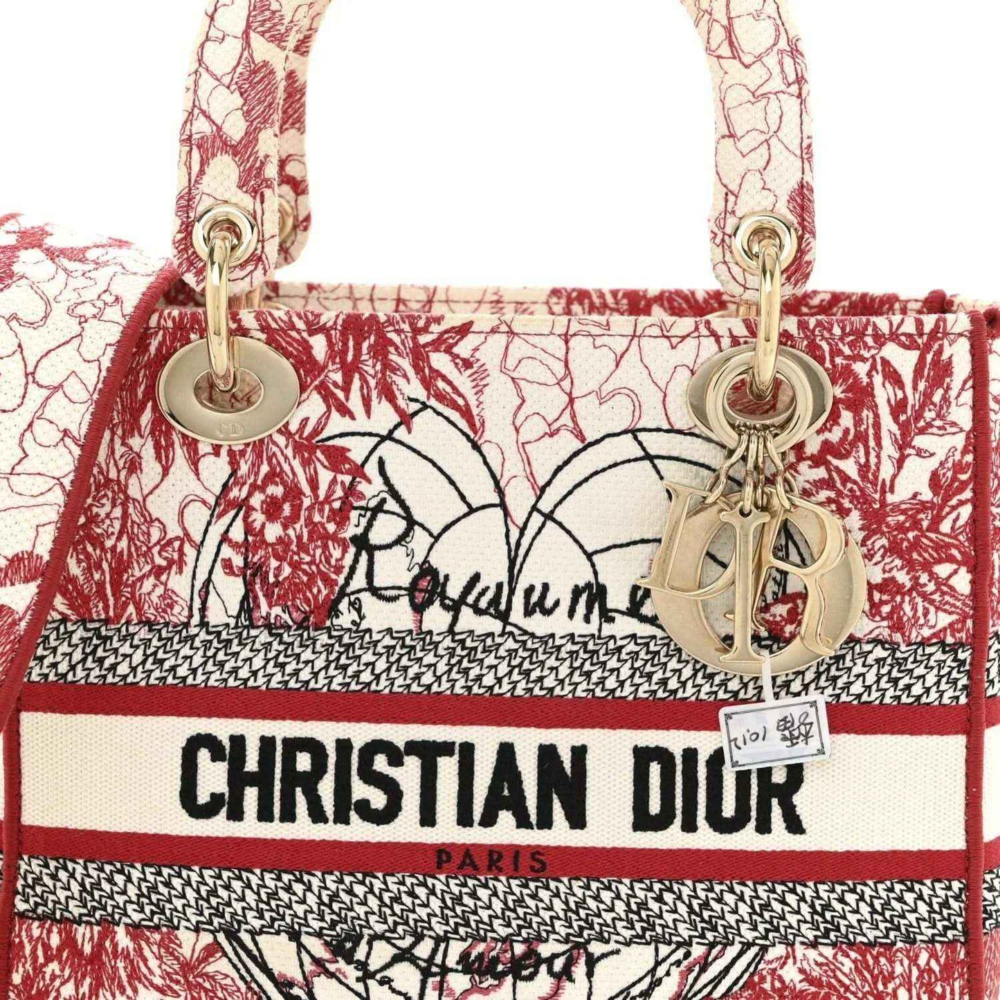 Embroidered canvas tote with Christian Dior logo stripe, red-and-white hearts, gold charms.