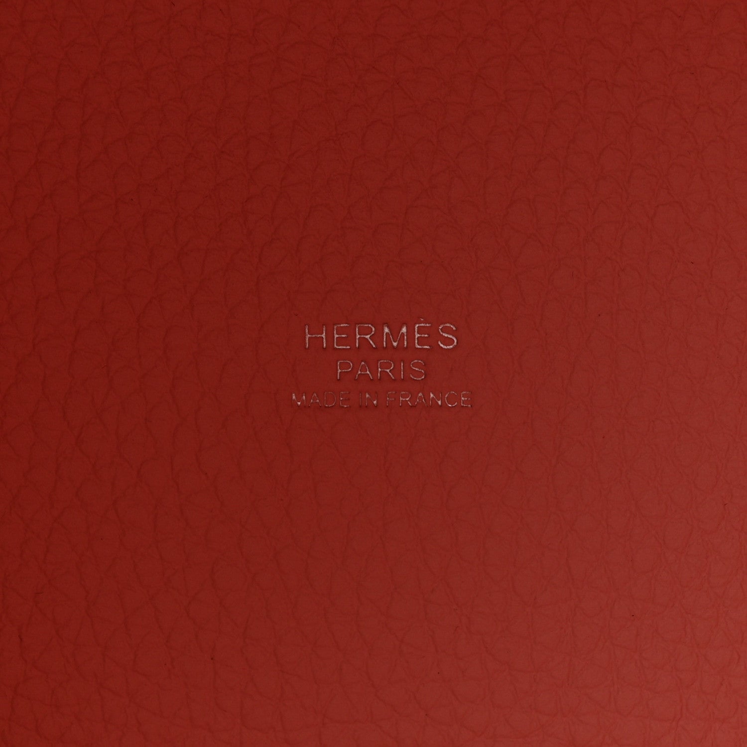 Rose pink embossed leather panel with HERMES PARIS logo