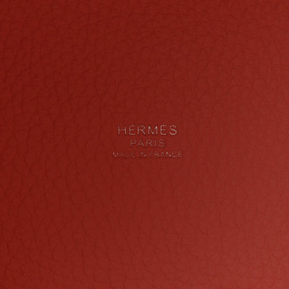 Rose pink embossed leather panel with HERMES PARIS logo