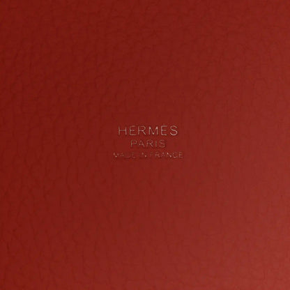 Rose pink embossed leather panel with HERMES PARIS logo