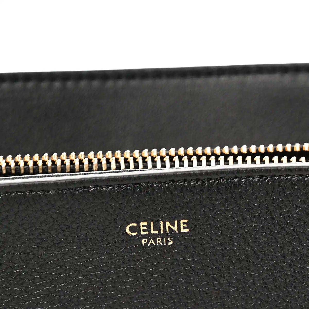 Black leather zipper lining with CELINE PARIS logo lettering