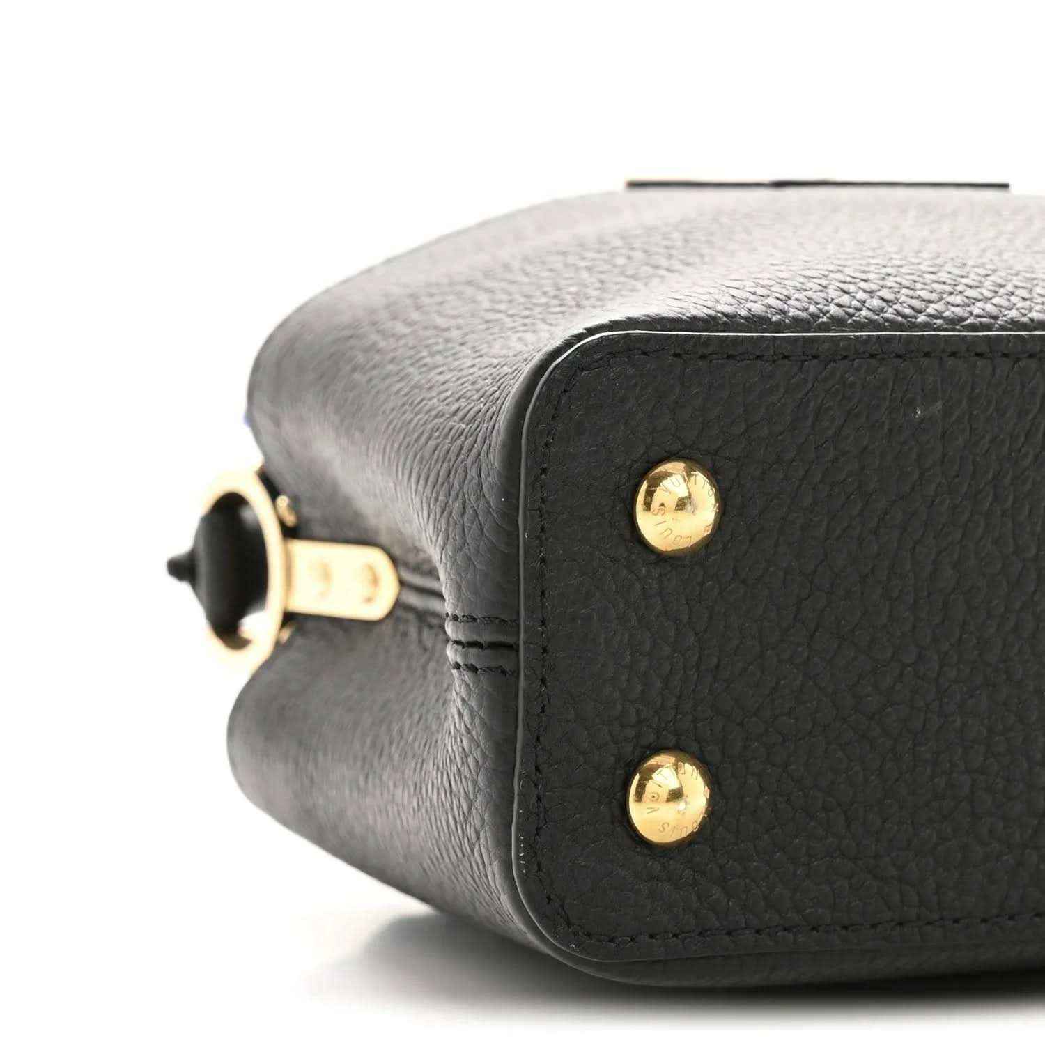 Black pebbled leather mini handbag side with gold snap and hardware