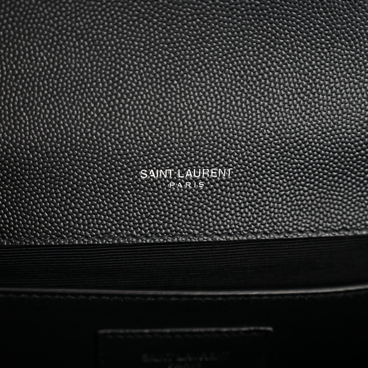 Black embossed leather satchel with SAINT LAURENT PARIS logo