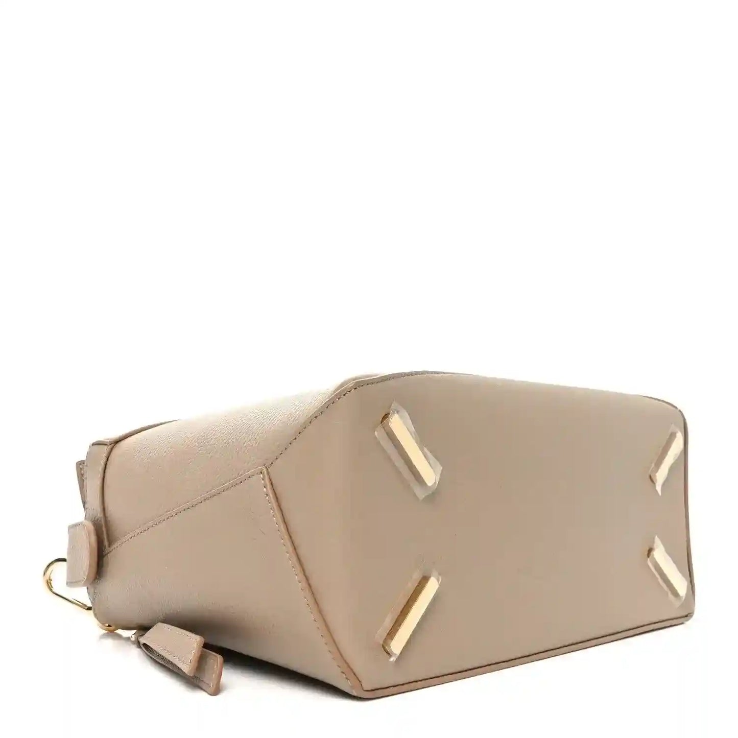 Large leather puzzle edge bag in sand with top handle and gold-tone hardware.