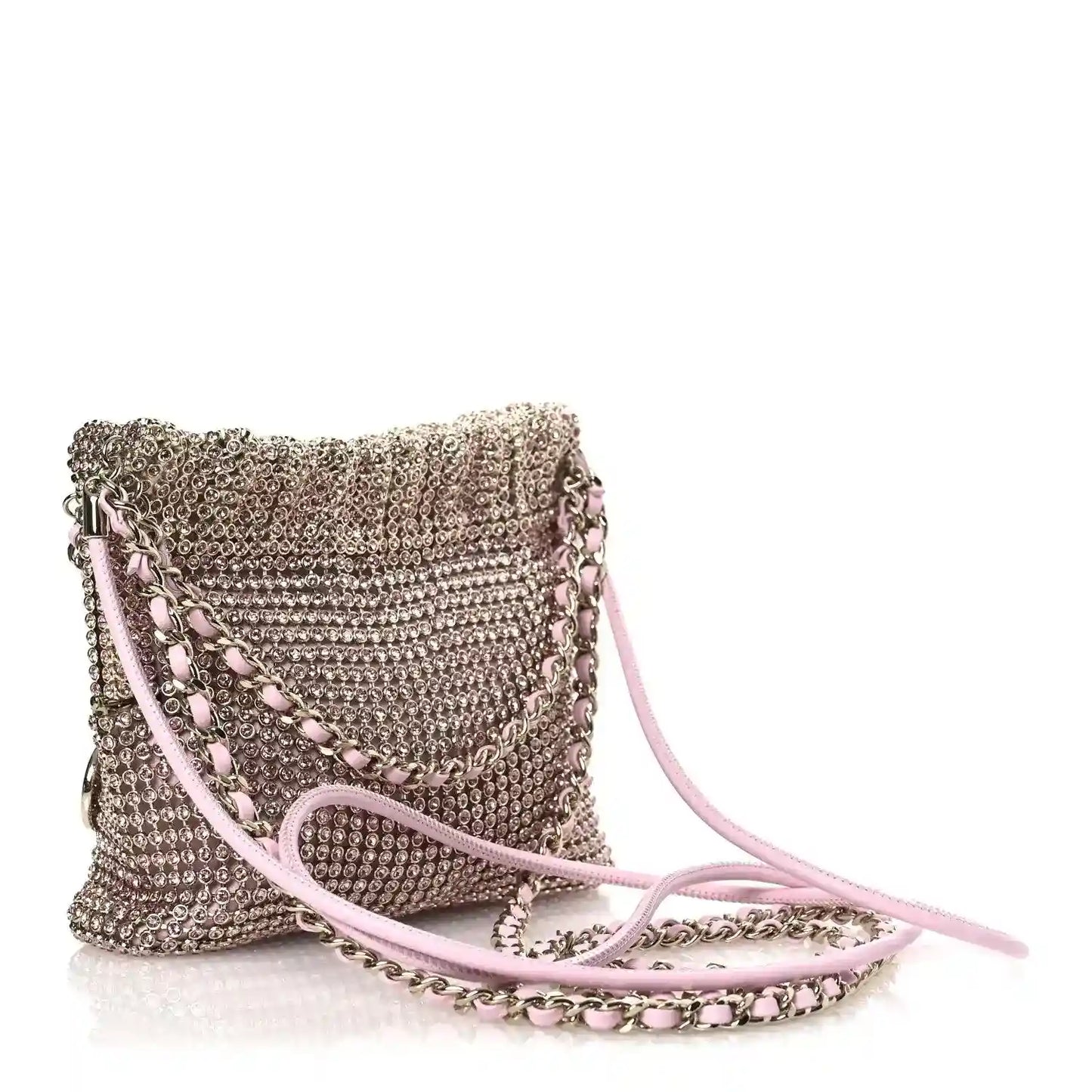Chanel Mini 22 handbag with pink metallic crystal texture, chain strap, and pink leather cord.