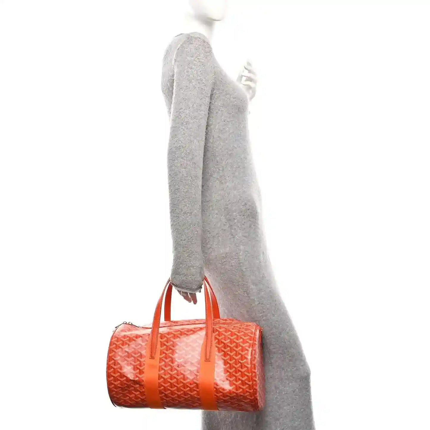 Orange monogram canvas barrel sports bag with side zipper and carrying handle.