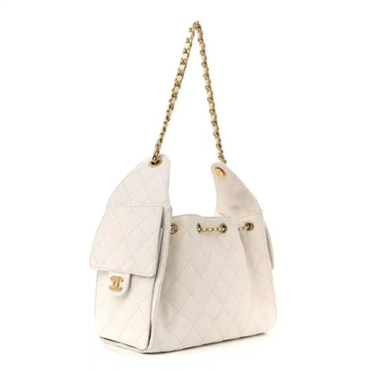 White quilted caviar leather handbag with chain straps and front flap
